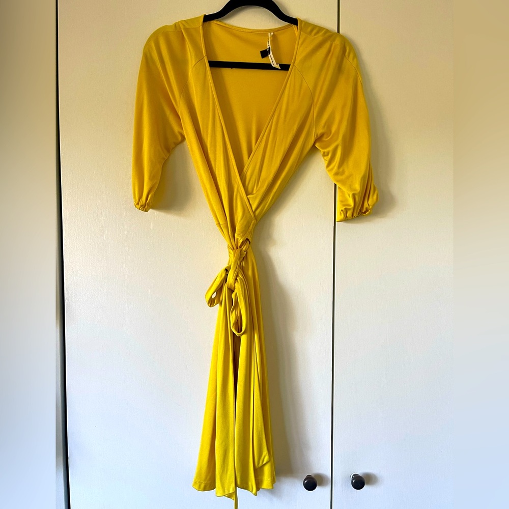 Beautiful Yellow Diane Von Furstenberg wrap dress.